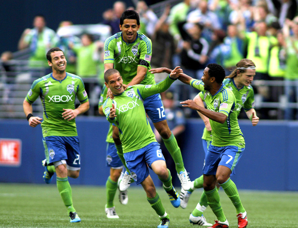 The Sounders celebrating during brighter times. • PHOTO VIA SUZANNE TENNANT, CAL SPORT MEDIA