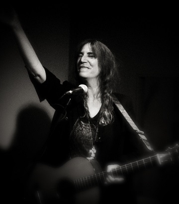 Patti Smith in concert.
Photo by August Brill via Flickr Creative Commons.